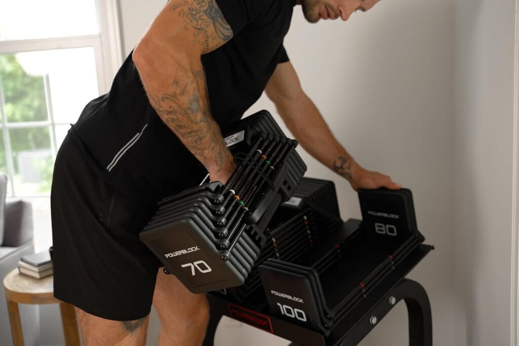 PowerBLock Pro 100 Adjustable Dumbbell bicep exercise